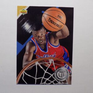 A Cheaney, Calbert card with a player dunking a ball.