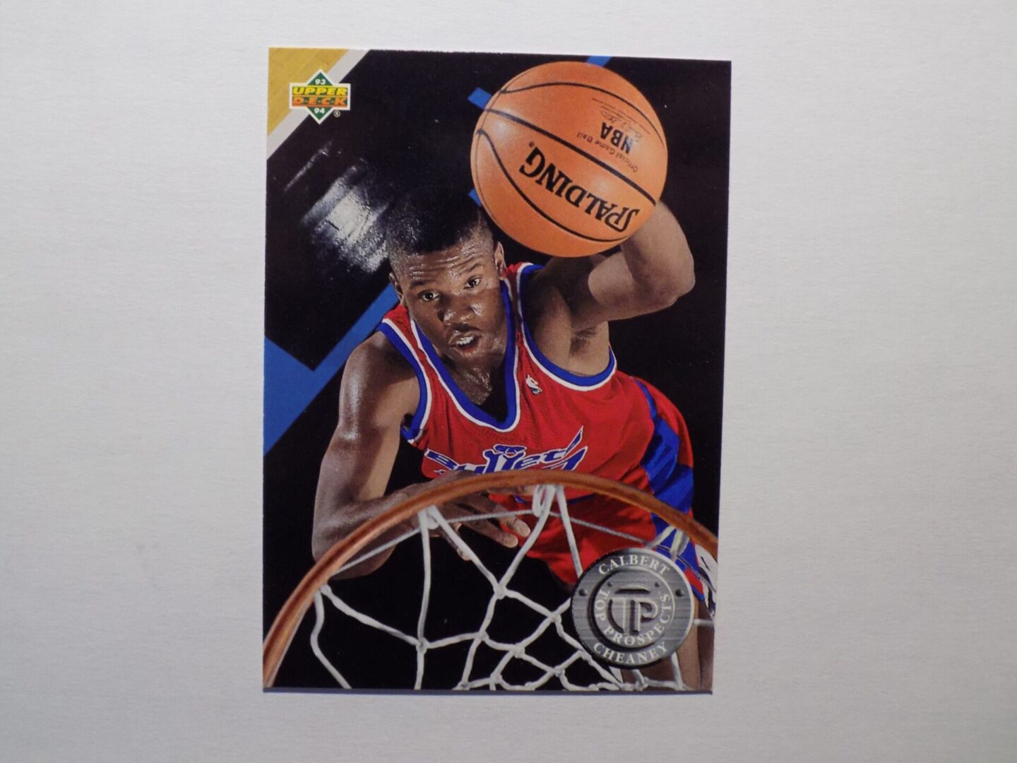 A Cheaney, Calbert card with a player dunking a ball.