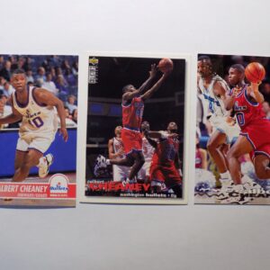 A set of Cheaney, Calbert basketball cards with different players on them.