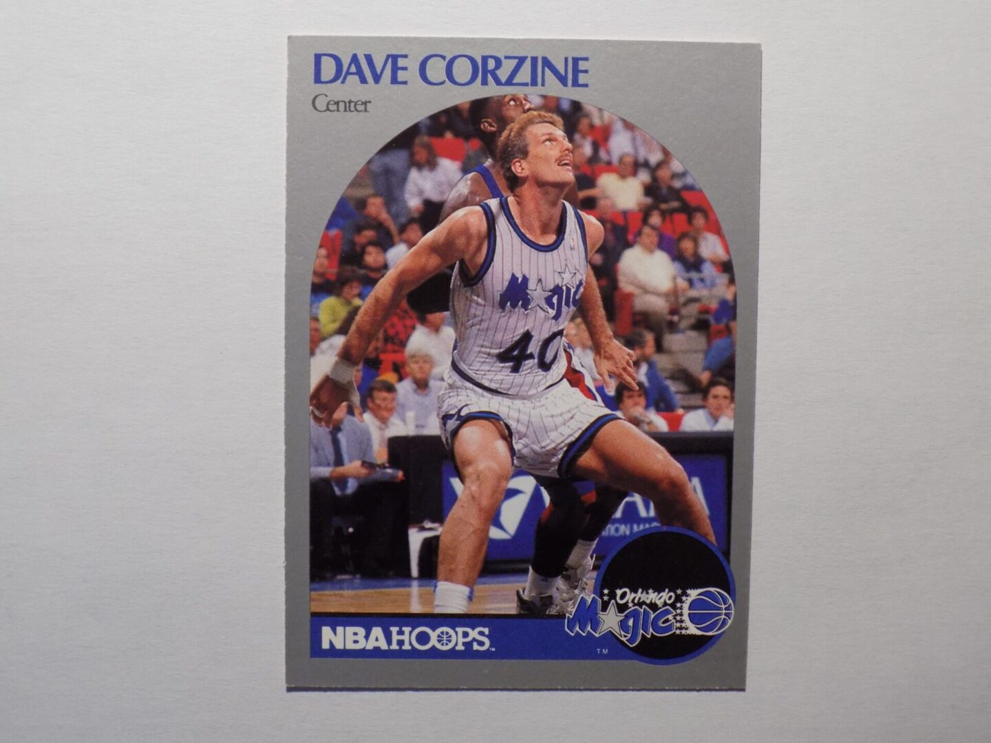 A basketball card with a picture of Dave Corzine.