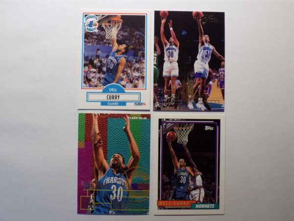 A set of Del Curry basketball cards with a player in the air.