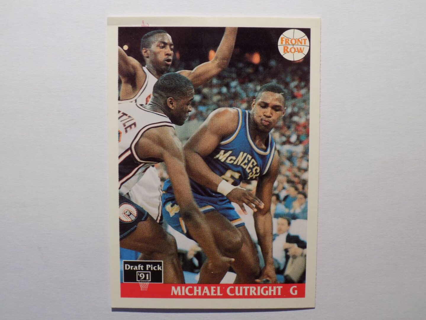 A basketball card with Cutright, Michael on it.