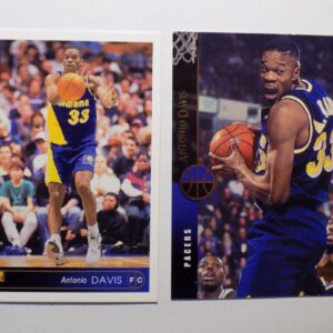 A pair of Antonio Davis basketball cards with a man playing basketball.