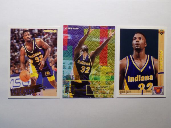 Three basketball cards with different players on them - Davis, Dale.