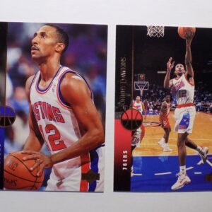 A pair of Dawkins, Johnny basketball cards with two players on them.