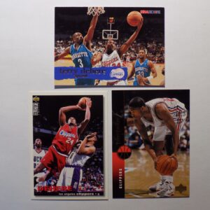 A group of DeHere, Terry basketball cards with DeHere, Terry in the middle.