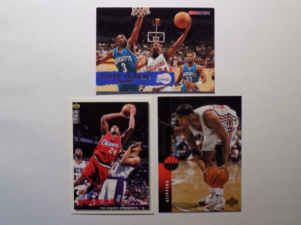 A group of DeHere, Terry basketball cards with DeHere, Terry in the middle.