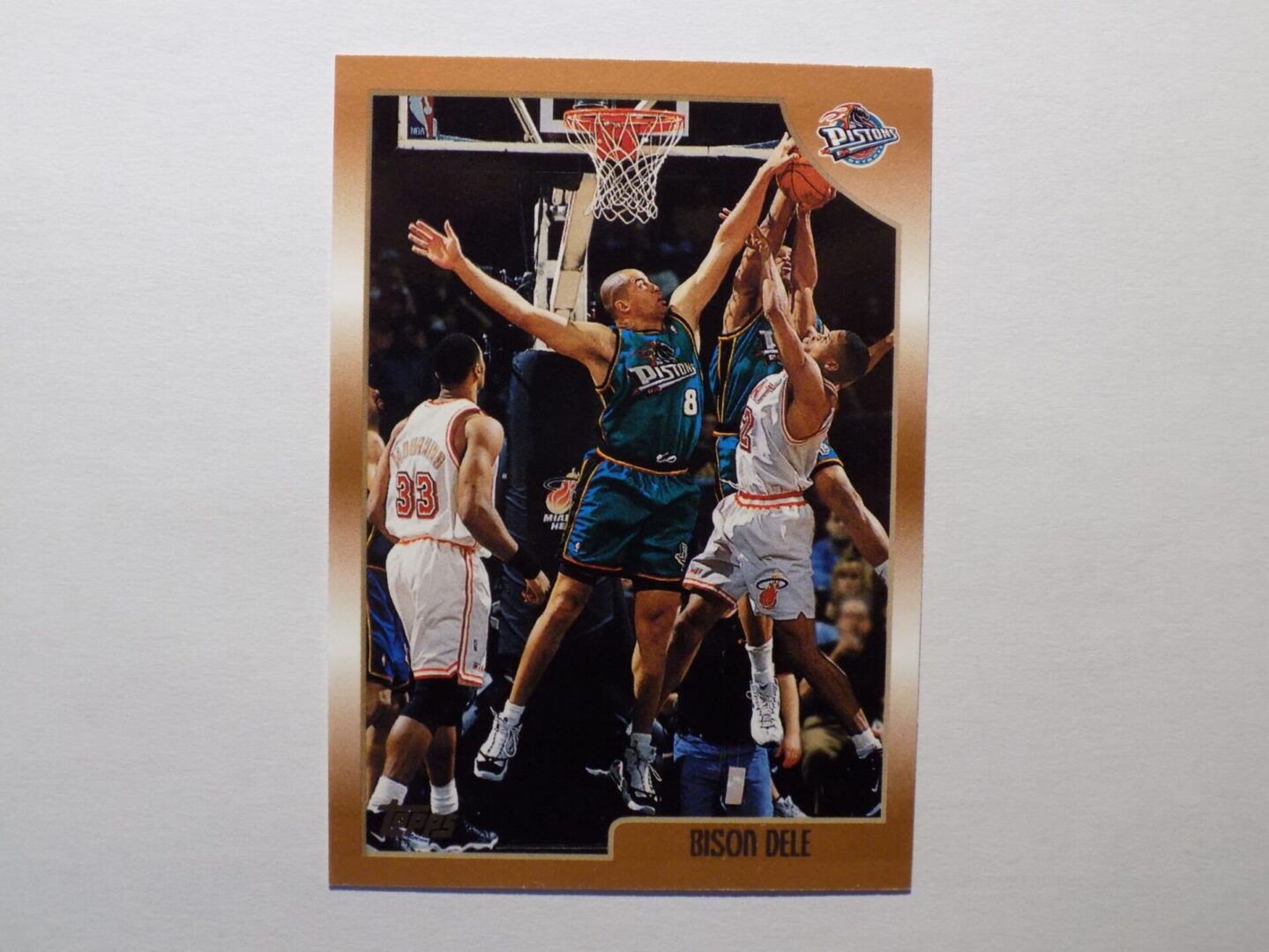 A Dele, Bison card with a basketball player on it.