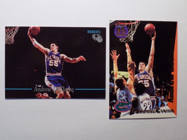 A pair of DeClercq, Andrew basketball cards with a player in the air.