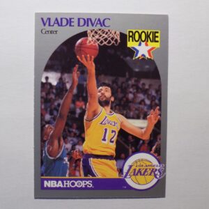 A basketball card with a picture of Divac, Vlade, a Lakers player.