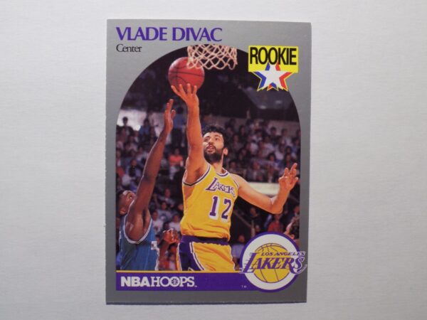 A basketball card with a picture of Divac, Vlade, a Lakers player.