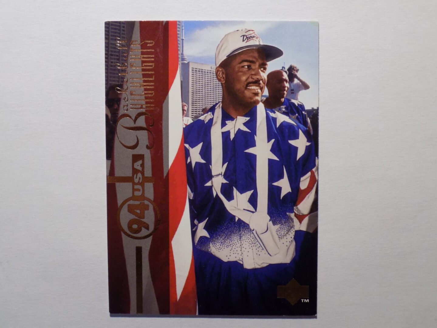 A Dumars, Joe baseball card with an american flag on it.