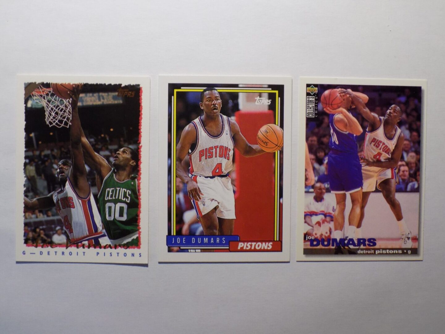 New York Knicks NBA trading cards featuring Dumars, Joe.