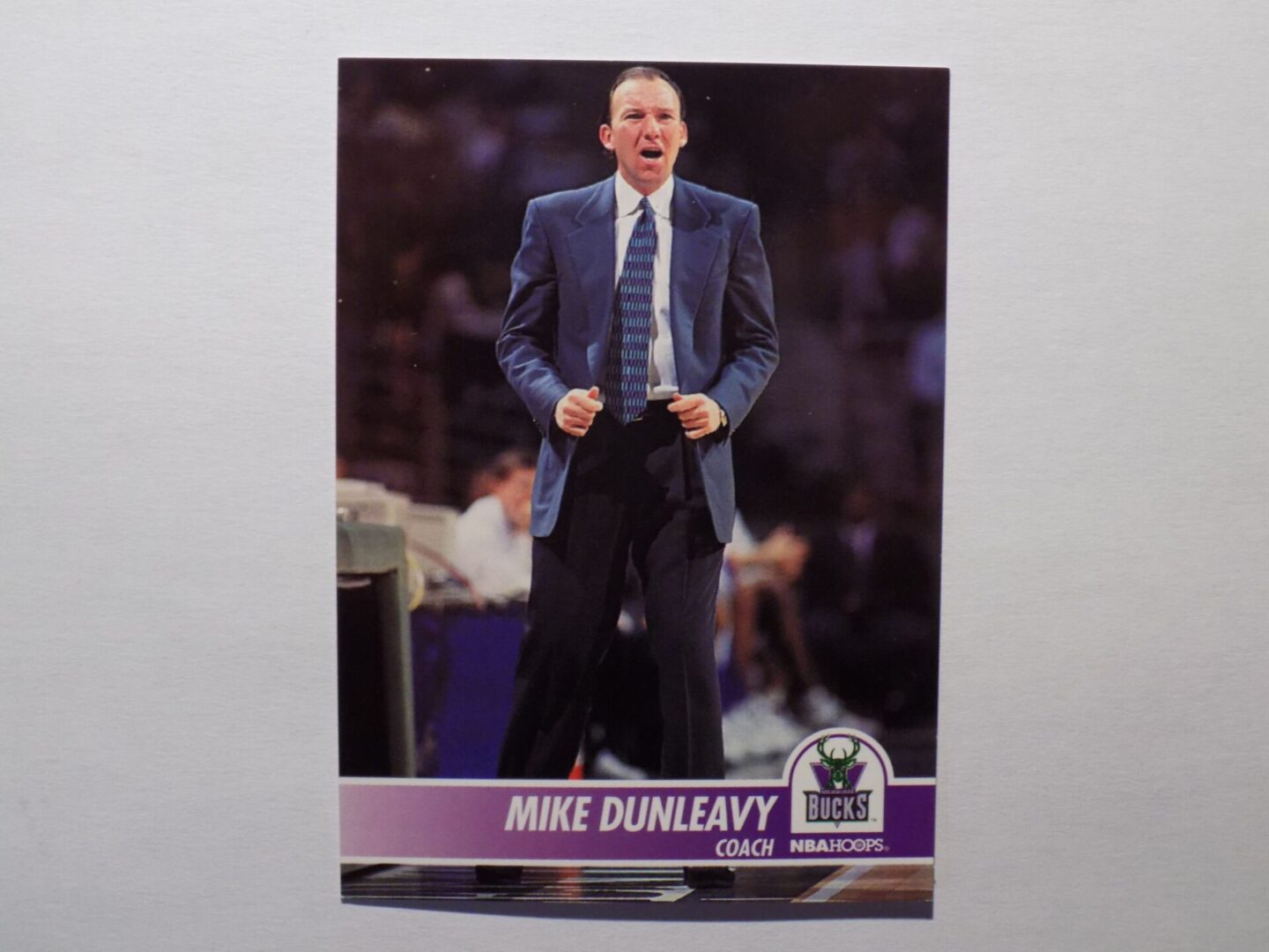 A Dunleavy, Mike card with a man in a suit.