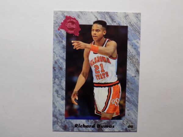 A Dumas, Richard card with a basketball player on it.