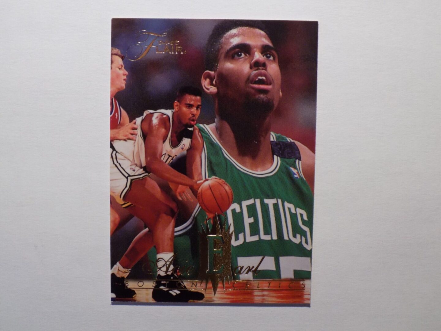 A Earl celtics basketball card with a picture of a player.