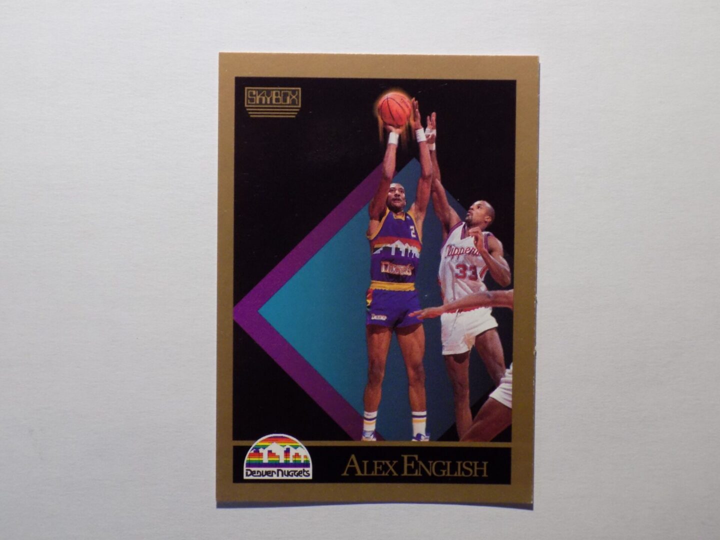 A basketball card with an image of English, Alex.