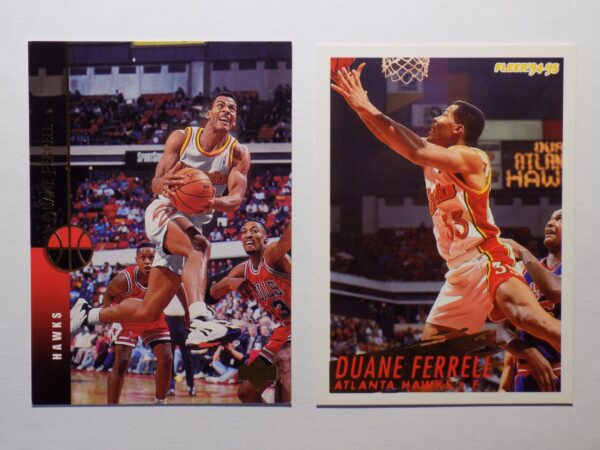 A pair of Ferrell, Duane cards with a basketball player and a basketball player.