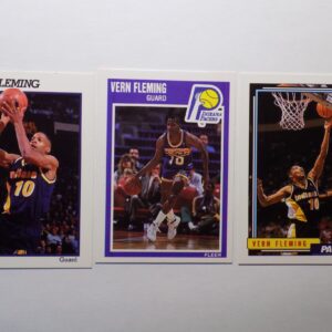 Three Fleming, Vern basketball cards with a basketball player in the middle.