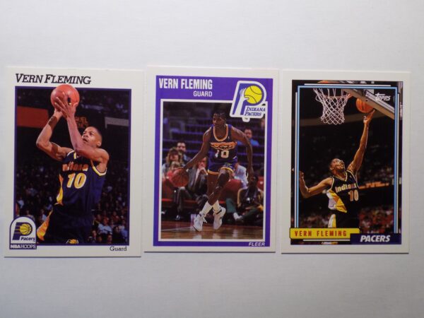 Three Fleming, Vern basketball cards with a basketball player in the middle.