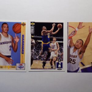 Three basketball cards with Gatling, Chris players on them.