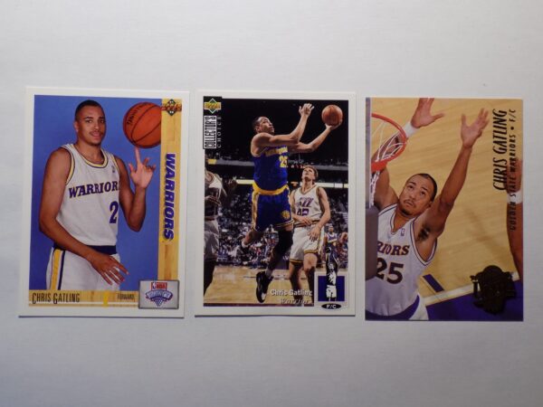 Three basketball cards with Gatling, Chris players on them.