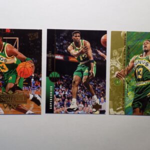 A set of Gill, Kendall basketball cards with three players on them.