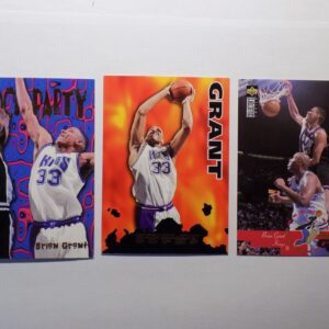 Three Grant basketball cards with Grant on them.