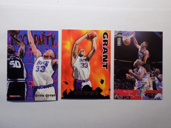 Three Grant basketball cards with Grant on them.