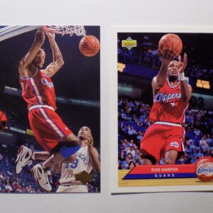 A pair of Harper, Ron basketball cards with a player in the air.