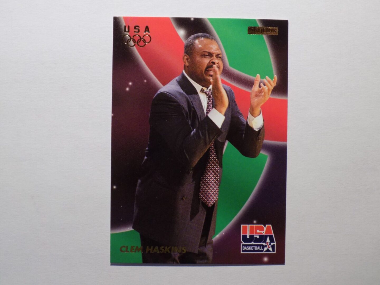 A card with a picture of Haskins, Clem in a suit.