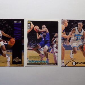 Three Hawkins, Hersey basketball cards with different players on them.