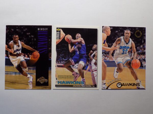 Three Hawkins, Hersey basketball cards with different players on them.