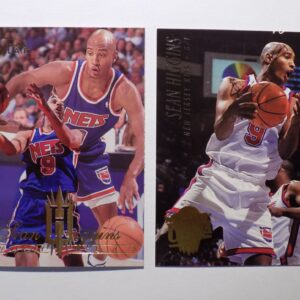 A pair of Sean Higgins basketball cards with two players on them.