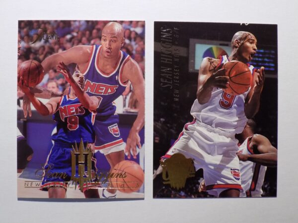 A pair of Sean Higgins basketball cards with two players on them.