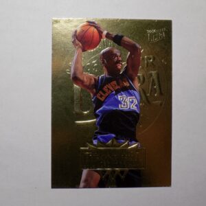 A Hill, Tyrone basketball card with a basketball player on it.