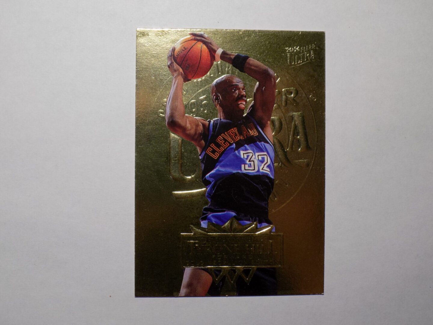 A Hill, Tyrone basketball card with a basketball player on it.