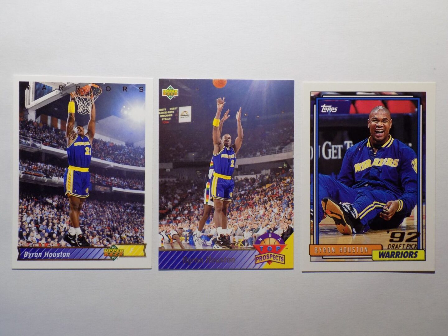 Three Houston, Byron basketball cards with a basketball player on them.