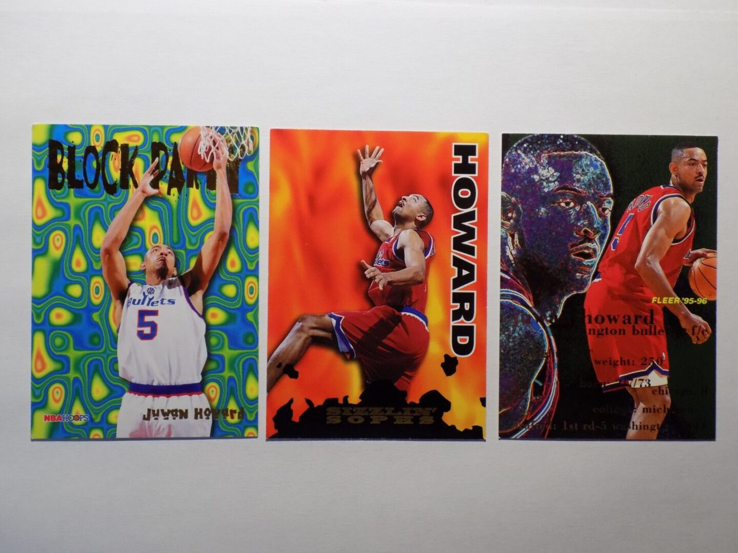 Three basketball cards with a Howard, Juwon player on them.