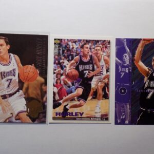 Three Hurley basketball cards with different players on them.