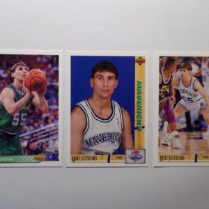 Three Iuzzolini, Mike basketball cards with different players on them.