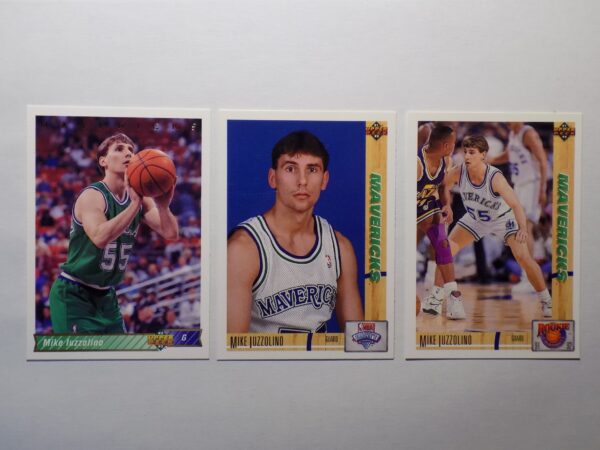 Three Iuzzolini, Mike basketball cards with different players on them.