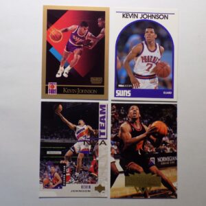 A group of Johnson, Kevin basketball cards on a white surface.