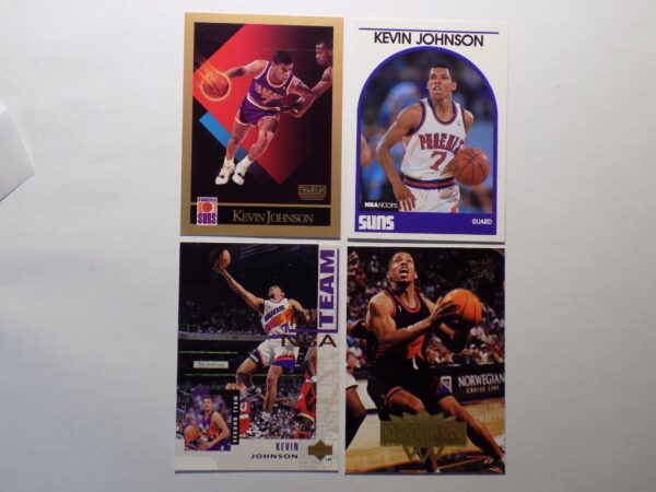 A group of Johnson, Kevin basketball cards on a white surface.