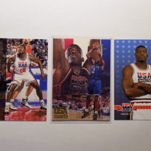 Three Johnson, Larry basketball cards with different players on them.