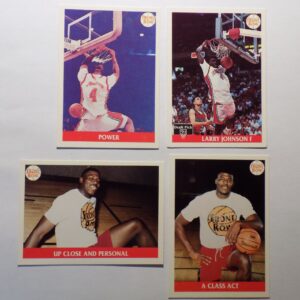 A set of four Johnson, Larry basketball cards with Johnson, Larry in the middle.