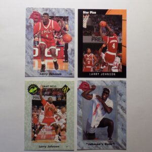 A set of basketball cards with a picture of Larry Johnson.