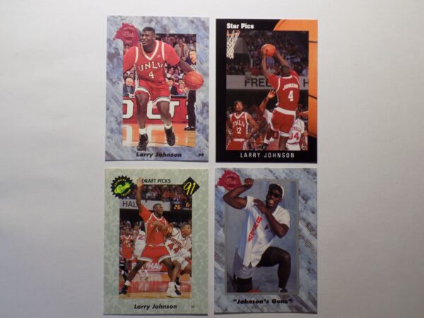 A set of basketball cards with a picture of Larry Johnson.