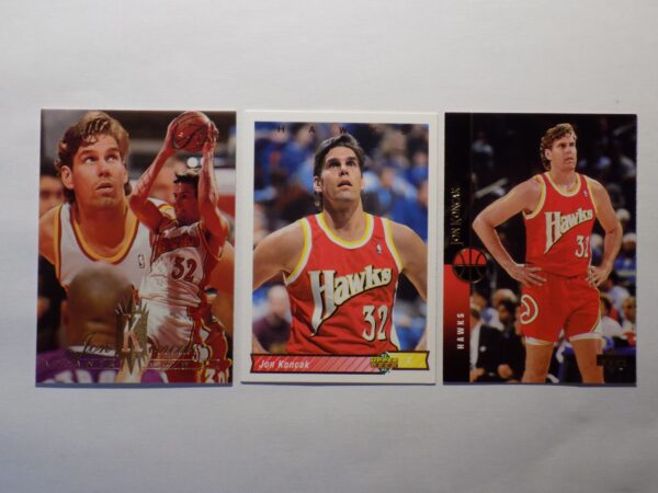 Three Koncak, Jon basketball cards with different players on them.