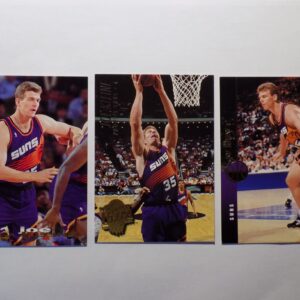 Three basketball cards with Kleine, Joe players on them.